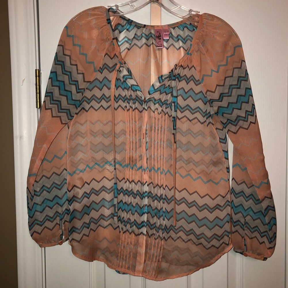 Juniors size large blouse. Very trendy and cute!